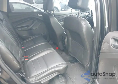 2015 Ford Escape Titanium z USA, uszkodzony, nr VIN 1FMCU9JX8FUB68371